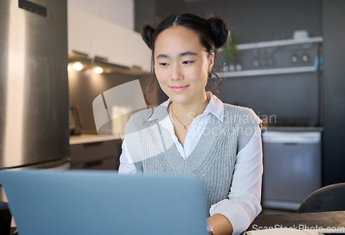 Image of Remote work, laptop and freelancer woman is working at her home typing growth strategy or project online. Employee, worker or Asian consultant doing research for the business or startup