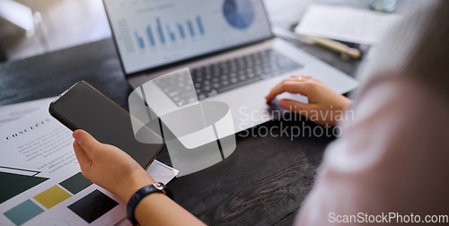 Image of Phone, laptop data and hands of woman in office working on marketing or advertising project. Mobile smartphone, computer and female freelancer or remote worker research statistics, charts or graphs.