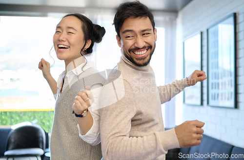 Image of Couple, love and dance in home living room, having fun and laughing while enjoying time together. Music freedom, diversity and interracial man and woman dancing, smile and bonding in lovely house.