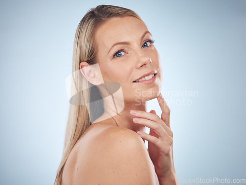 Image of Face portrait, beauty and skincare of woman in studio isolated on a gray background. Makeup, cosmetics and female model happy and satisfied after spa facial treatment for healthy and glowing skin.