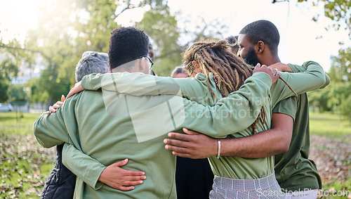 Image of Group hug, support and people in park for eco friendly, sustainable or community service project, teamwork or love. Together, circle and diversity, inclusion friend in forest or nature for earth day