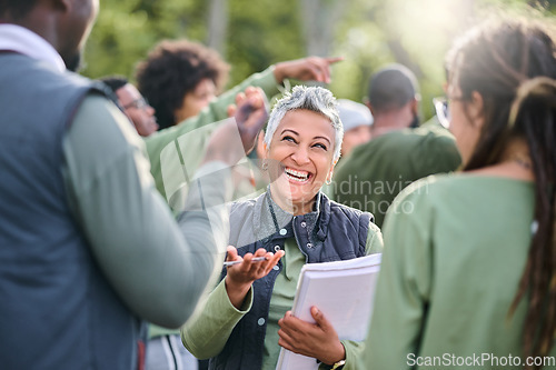 Image of Volunteer, team and people in nature for community service, teamwork and planning with leadership, goals and strategy. Senior person or leader for management in forest, park or eco friendly project