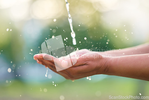 Image of Outdoor, hands and man with water in nature for washing, cleaning or body hygiene hydration. Natural, organic and African male hand with aqua to wash or clean to prevent germs, dirt or dust outside.