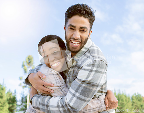 Image of Couple, portrait smile and hug for summer vacation, travel or holiday break together outdoors. Happy man and woman hugging, smiling and enjoying traveling, trip or getaway in nature happiness