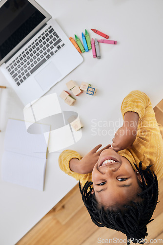 Image of Education portrait, notebook and kid with laptop for online home school, remote elearning and child development. E learning, color crayons and top view of African student study with creative software