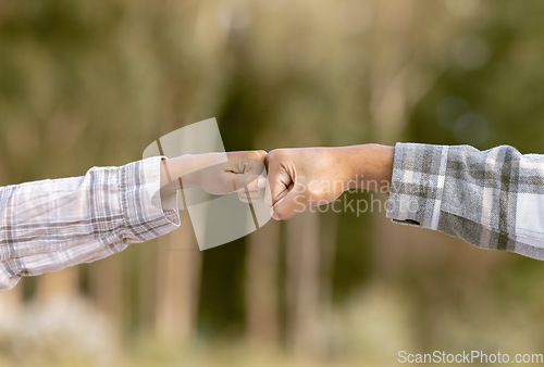 Image of Hands, fist bump and friends in agreement, deal or collaboration on mockup blurred background. Hand of people touching fists in team building, support or partnership for victory, unity or community