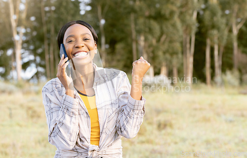 Image of Winning, success and black woman on a phone call in nature, happy and excited about achievement. Winner, communication and African girl listening on a mobile in a field in Australia with mockup