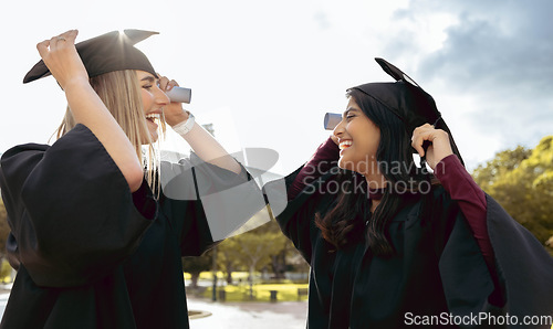 Image of Graduate women, friends and smile together with graduation cap, congratulations and success for studying. University student, gen z girl and excited with diversity, goal and happiness for achievement