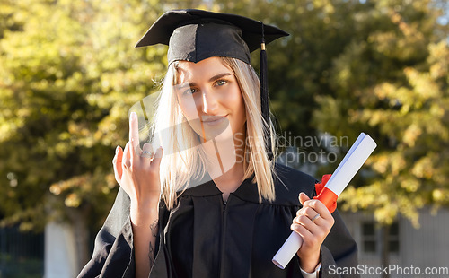 Image of University student woman, middle finger and holding certificate in portrait, hand sign and success. Gen z girl, graduate celebration and education with smile, happiness or diploma for degree