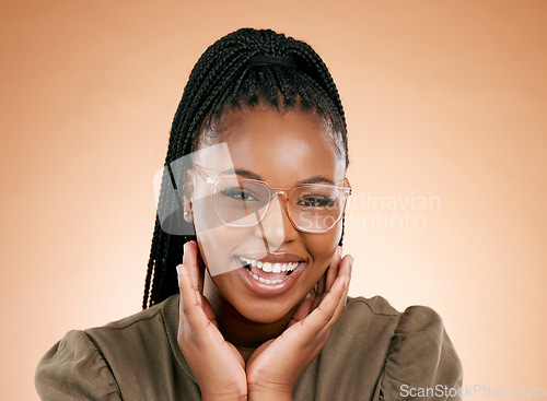 Image of Black woman, fashion and retail frame portrait of a young person smile in a studio with happiness. Brown background, eye health wellness and vision of african female ready for lens frames choice