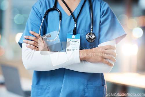 Image of Doctor, arms crossed and stethoscope for healthcare advice, cardiology or consulting for wellness at hospital. Hands of confident medical professional, expert or specialist consultant at the clinic