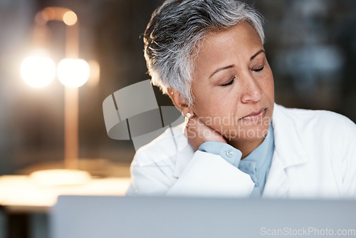 Image of Night, stress and neck pain with doctor at laptop for medical, thinking and deadline review. Burnout, accountability and mental health with senior woman for healthcare, medicine and science research