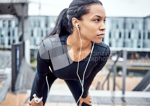 Image of Fitness, motivation and black woman with music in city for wellness, healthy body and cardio workout outdoors. Sports, focus and girl listening to audio for exercise, running and marathon training