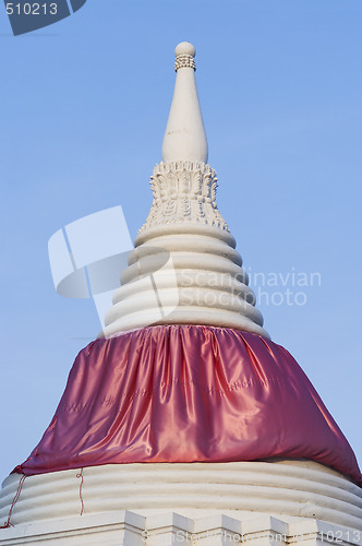 Image of White cheddi with pink cloth