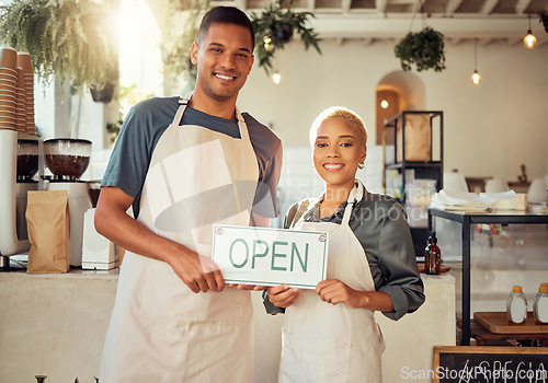 Image of Colleagues, coworkers and small business owners with open sign and happy at restaurant in support together. Team, collaboration and friends smiling for startup growth and proud of success or vision