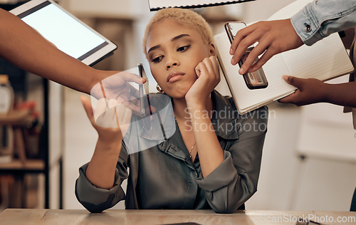 Image of Bored, uninterested or multitasking and a business black woman in the office with her demanding team. Phone call, tablet and notebook with an overworked female employee feeling unhappy at work