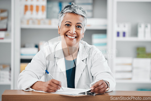 Image of Senior woman, pharmacist portrait and paper data of pills stock, insurance or medical documents. Healthcare, doctor and elderly female wellness consultant with happiness and smile about pharmacy