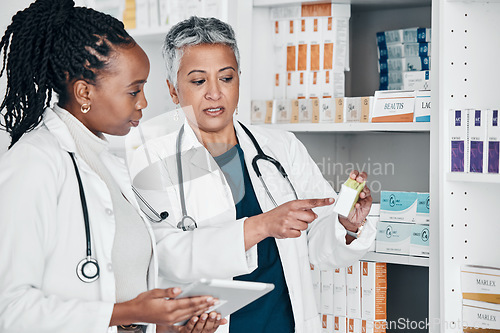 Image of Pharmacy, inventory and women on digital tablet for prescription, label and information check. Pharmacist, colleagues and ladies online, internet and search while doing stock at a clinic dispensary