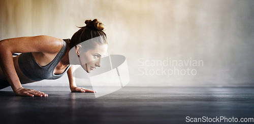 Image of Woman, fitness and pushups on mockup for exercise, workout or intense training on floor. Sporty female lifting body off the ground with arm strength in motivation for healthy cardio or exercising