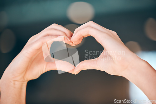 Image of Heart sign with hands, love and emoji with care and connection with positive energy, kindness and wellness. People, symbol or icon with skin, health and peace, commitment and respect with romance