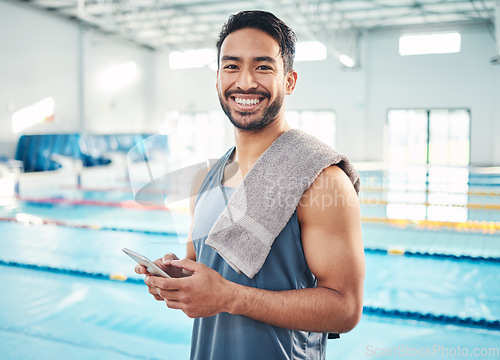 Image of Portrait, swimming pool or man with smartphone, smile or connection for social media, typing or break. Face, male swimmer or athlete with cellphone, communication or share post with healthy lifestyle