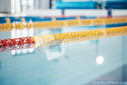 Image of Pool, lanes in water for competition or racing lines for fitness or underwater sports empty with reflection. Exercise, workout and fresh, clear swim training arena lanes for swimming race with nobody