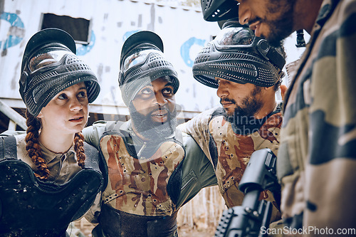 Image of Paintball, team or friends together for a game while planning and talking strategy for attack or action. Diversity men and women group for military, soldier or army person in outdoor battlefield