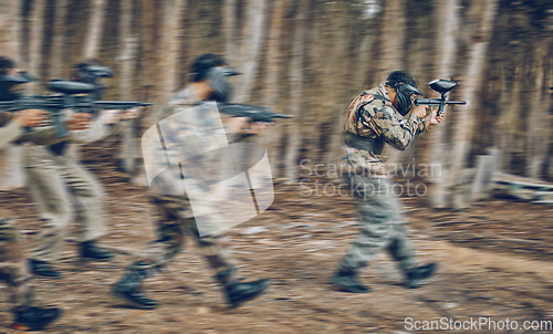 Image of Motion, blur and men running during paintball game, competition and military training in nature. War, field and friends moving with gun for battle, action and cardio in the woods or forest of Mexico