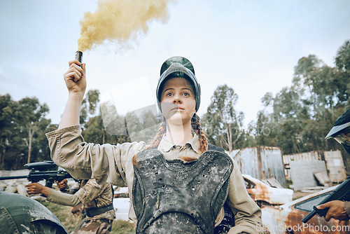 Image of Nature, battle and girl with smoke during paintball, military training and army game in Spain. War, alert and woman playing with gear and equipment during a competition, sports and action on a field