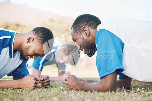 Image of Push up, team and football player coaching on field for training, practice and sports challenge and muscle power. Group of soccer people or men on grass or ground for workout with personal trainer