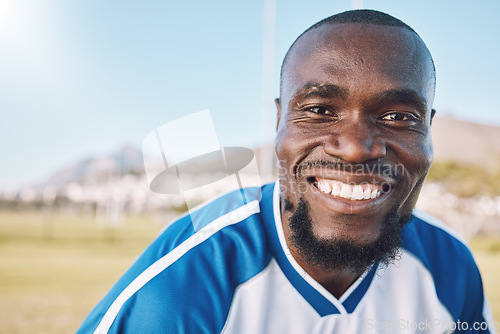 Image of Portrait of black man with smile on face, football and sports mindset with motivation for winning game in Africa. Confident, proud and happy professional soccer player at exercise or training match.