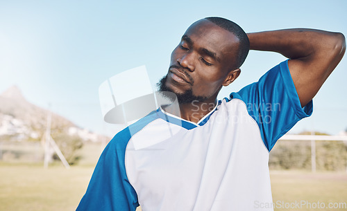 Image of Soccer, black man and stretching before game, training or exercise for wellness, preparation for match or energy. African American male athlete, guy or football player stretch neck, fitness or sports