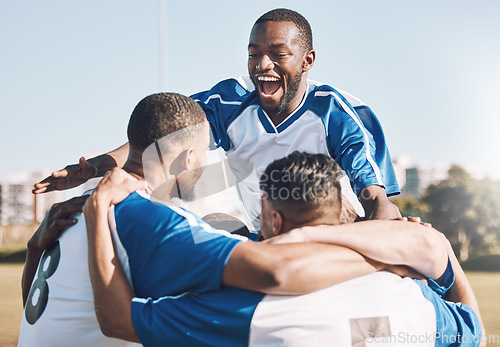 Image of Soccer, celebration and men winning sports competition or game with teamwork on a field. Football champion group, friends or people happy and excited for goal, performance and fitness achievement