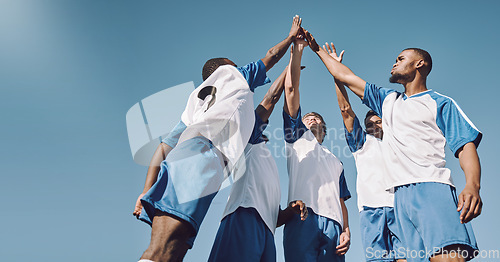 Image of Soccer, team high five and men celebrate winning at sports competition or game with teamwork on field. Football champion group with motivation hands for a goal, performance and fitness achievement