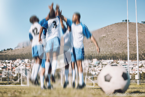 Image of Soccer men, high five and men celebrate winning at sports competition or game with teamwork on a field. Football champion group people happy celebration for goal, performance and fitness achievement