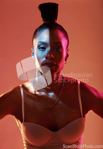 Image of Portrait, beauty and kaleidoscope with a model black woman in studio on a neon background for fashion. Art, makeup and style with an attractive young female posing indoor for culture or cosmetics