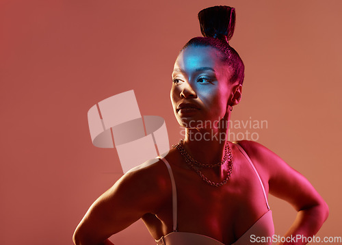 Image of Light, beauty and black woman profile with mockup feeling sexy and mystical with studio lights. Brown background, isolated and glow of a female model with blue face lighting and glamour pose