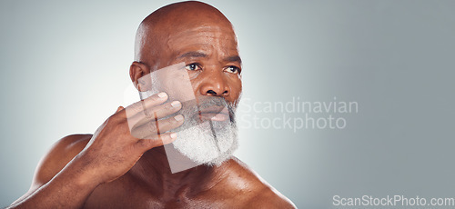 Image of Skincare, grooming and face of black man for wellness, haircare and healthy skin on gray background. Beauty mockup, advertising and senior male pose for beard care, facial treatment and dermatology