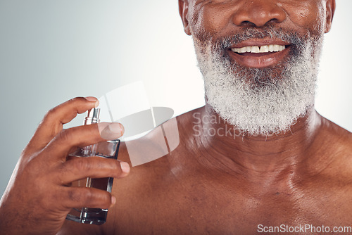 Image of Old man, perfume with skin and smile for beauty, grooming and hygiene isolated on studio background. Happiness, wellness and skincare, cosmetic product and topless with body cologne and fragrance