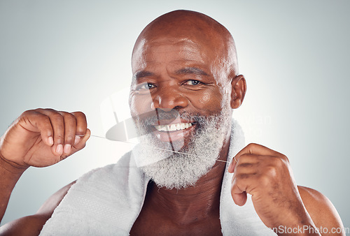 Image of Floss, portrait and teeth of man isolated on white background for senior mouth, self care smile and cleaning. African model or elderly person with product for tooth, gum or dentist healthcare mockup