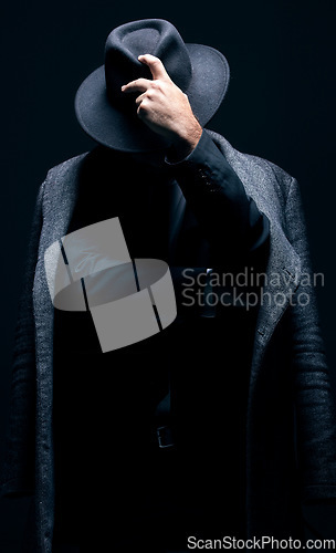 Image of Vintage, classy and mystery man in a suit isolated on a dark background in a studio. Business fashion, retro and stylish secret businessman for crime investigation, spy work and agent on a backdrop