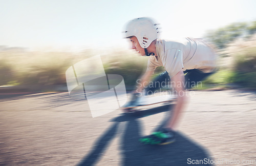 Image of Skate, blurred motion and speed with a sports man skating on an asphalt road outdoor for recreation. Skateboard, soft focus and fast with a male athlete or skater training outside on the street