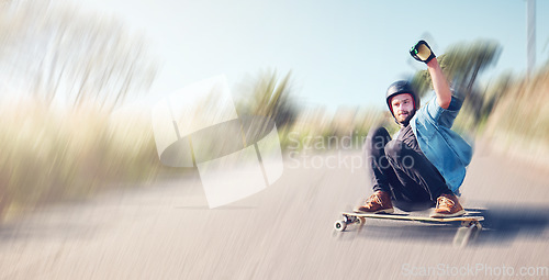 Image of Skateboard, motion blur or mockup with a sports man skating at speed on an asphalt street outdoor for recreation. Skate, soft focus and fast with a male athlete or skater training outside on the road