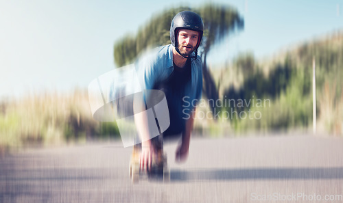 Image of Skater, motion blur and speed with a sports man skating on an asphalt road outdoor for recreation. Skate, soft focus and fast with a male athlete on a skateboard training outside on the street