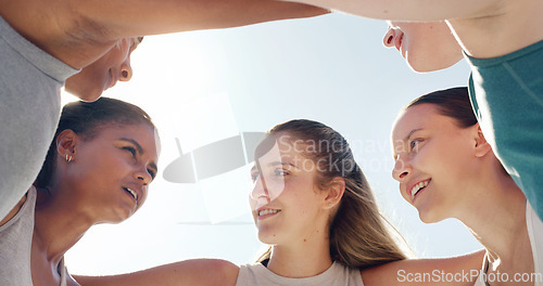 Image of Face, huddle or team with a sports woman and friends standing in a circle together before a game. Fitness, exercise and teamwork with a female group training outside for a competitive sport event