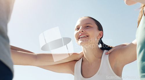 Image of Face, huddle or teamwork with a sports woman and friends standing in a circle together before a game. Fitness, exercise and training with a female team getting ready for a competitive event outside