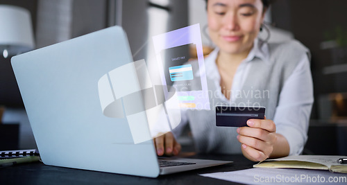 Image of Laptop, hologram and woman with credit card for online shopping, banking or smart payment. 3d fintech, ecommerce and futuristic computer ui with Asian female buying or paying bills in home at night.