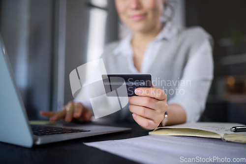 Image of Laptop, online shopping and hands of woman with credit card for digital banking or payment. Ecommerce, fintech and female with computer for buying, paying bills or finance budget in home at night.