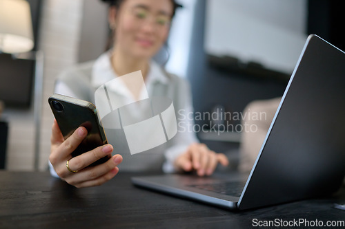 Image of Phone, networking or Asian woman with laptop for communication, social media or website blog content reading. Hand, typing or girl with smartphone for planning, research or internet digital search