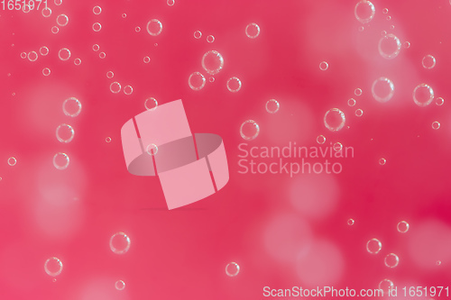 Image of red abstract background with water drops